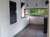 Проект стильного комфортного дома современного дизайна со встроенным гаражом - Z116