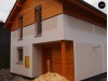 Проект простого и удобного дома для узкого участка с высокой аттиковой стеной - Z38